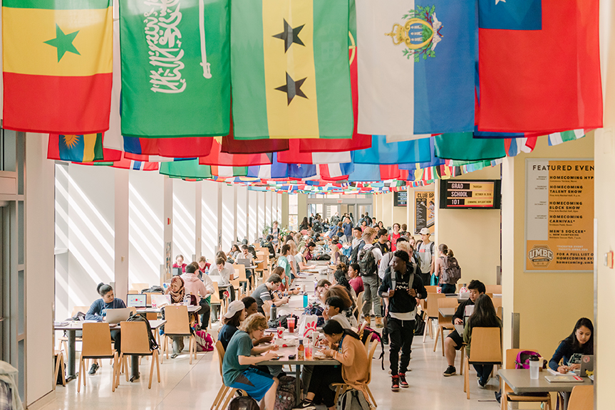 Sample image - Students eat under the flags UMBC Commons