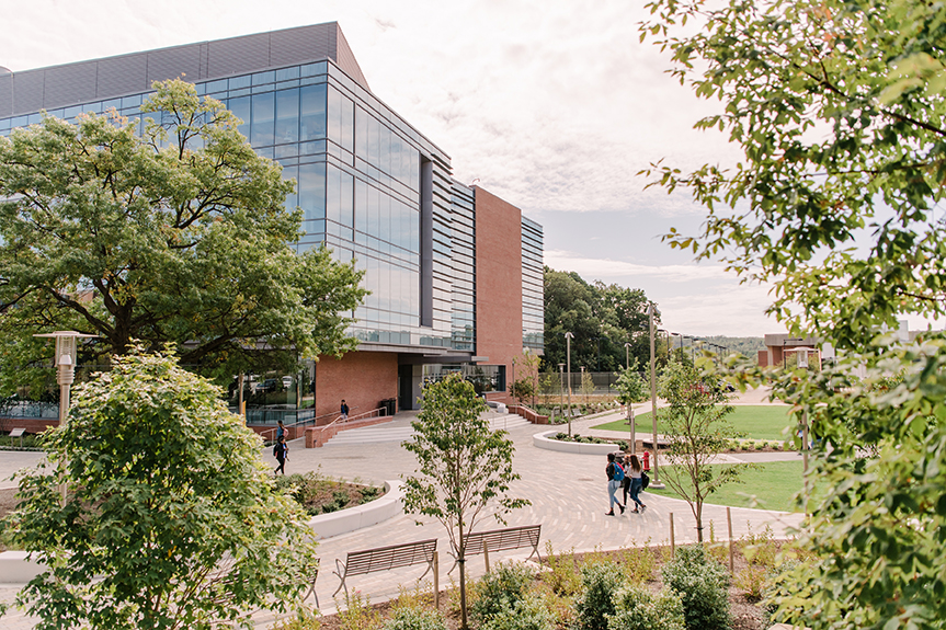 Sample image - Students walk past ILSB at UMBC